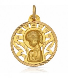 Medalla Virgen Niña calada de Oro amarillo de 18 Kl con borde tallado y forma redonda.Tiene un diámetro de 24 mm. - M231